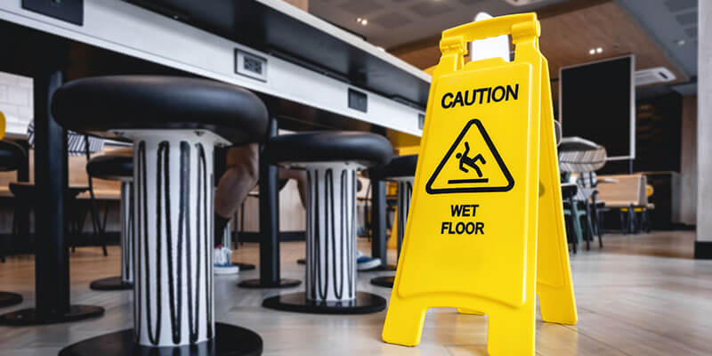 Caution wet floor sign to prevent accidents