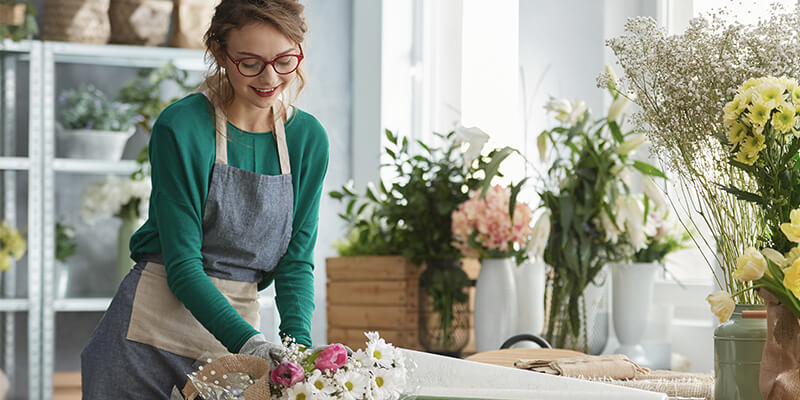 Florist working in a flower shop