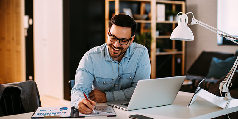 Male entrepreneur working a home